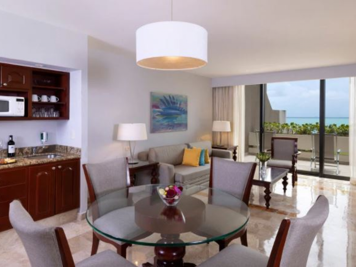 paradisus cancun premium two bedroom suite lagoon view kitchen living room 