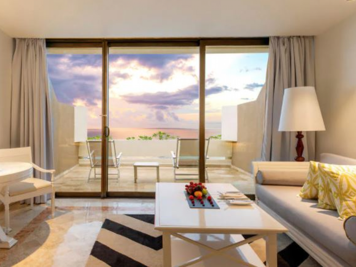 paradisus cancun the reserve one bedroom deluxe ocean view suite living room\